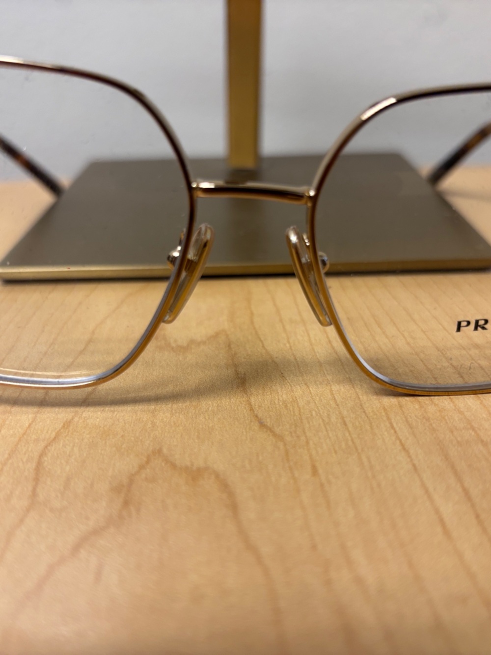 Prada Women's Gold Metal Frame Glasses with Clear Lenses